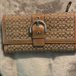 Coach wallet matching purse also available.